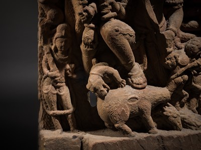 Lot 67 - A RED SANDSTONE RELIEF OF DURGA MAHISHASURAMARDINI, CENTRAL INDIA, CIRCA 10TH CENTURY