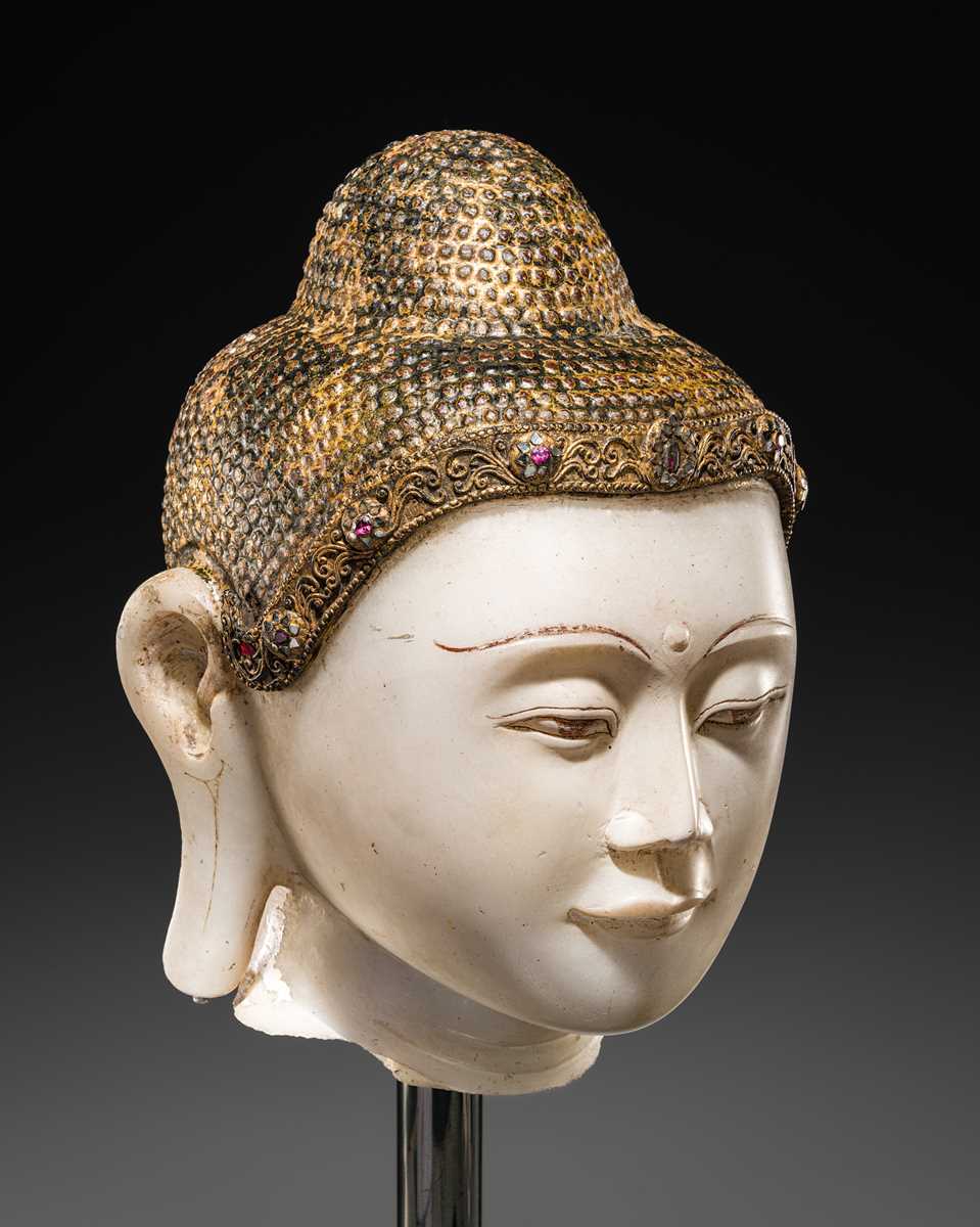Lot 19 - A MAGNIFICENT LARGE GILT AND PAINTED WHITE MARBLE HEAD OF BUDDHA, MANDALAY, 18TH-19TH CENTURY