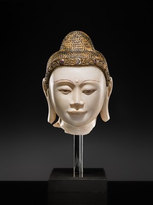 Lot 19 - A MAGNIFICENT LARGE GILT AND PAINTED WHITE MARBLE HEAD OF BUDDHA, MANDALAY, 18TH-19TH CENTURY