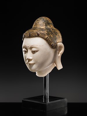 Lot 19 - A MAGNIFICENT LARGE GILT AND PAINTED WHITE MARBLE HEAD OF BUDDHA, MANDALAY, 18TH-19TH CENTURY