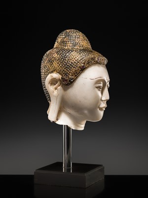 Lot 19 - A MAGNIFICENT LARGE GILT AND PAINTED WHITE MARBLE HEAD OF BUDDHA, MANDALAY, 18TH-19TH CENTURY