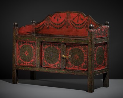 Lot 107 - A POLYCHROME WOOD READING TABLE AND CABINET, TIBET, 18TH-19TH CENTURY