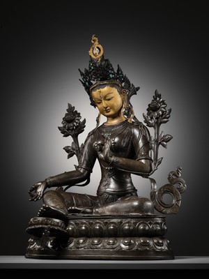Lot 92 - A LARGE AND IMPRESSIVE BRONZE FIGURE OF GREEN TARA, NEPAL, CIRCA 1900