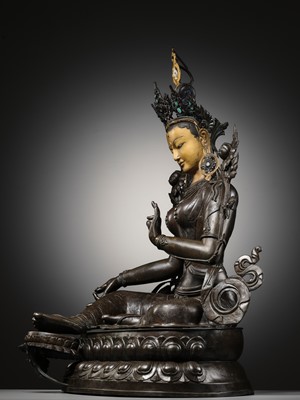 Lot 92 - A LARGE AND IMPRESSIVE BRONZE FIGURE OF GREEN TARA, NEPAL, CIRCA 1900