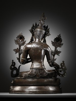 Lot 92 - A LARGE AND IMPRESSIVE BRONZE FIGURE OF GREEN TARA, NEPAL, CIRCA 1900