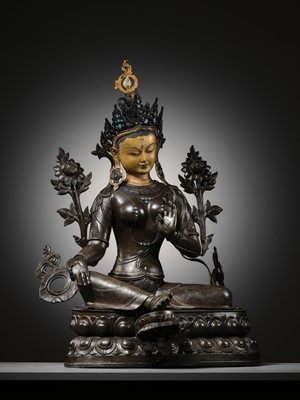Lot 92 - A LARGE AND IMPRESSIVE BRONZE FIGURE OF GREEN TARA, NEPAL, CIRCA 1900