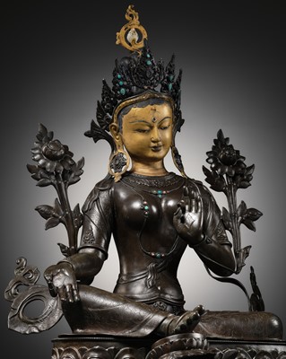 Lot 92 - A LARGE AND IMPRESSIVE BRONZE FIGURE OF GREEN TARA, NEPAL, CIRCA 1900