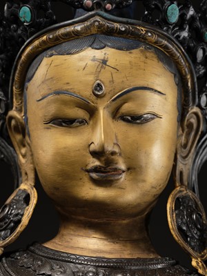 Lot 92 - A LARGE AND IMPRESSIVE BRONZE FIGURE OF GREEN TARA, NEPAL, CIRCA 1900