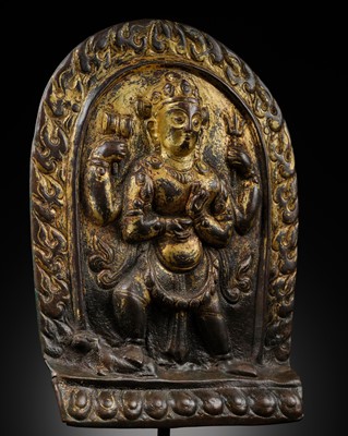 Lot 87 - A GILT-COPPER REPOUSSÉ PLAQUE OF A MALE DEITY, 17TH-18TH CENTURY