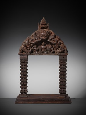 Lot 120 - A WOOD TORANA, NEPAL, CIRCA 16TH - 18TH CENTURY