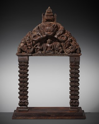 Lot 120 - A WOOD TORANA, NEPAL, CIRCA 16TH - 18TH CENTURY