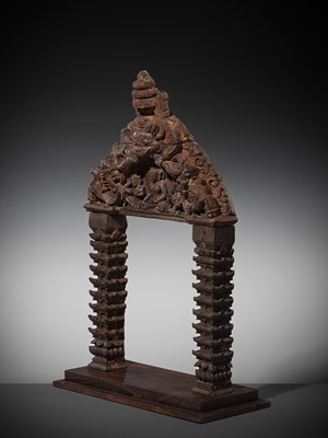 Lot 120 - A WOOD TORANA, NEPAL, CIRCA 16TH - 18TH CENTURY