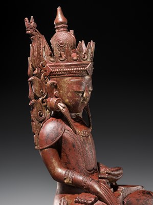 Lot 17 - A LARGE LACQUERED WOOD FIGURE OF JAMBUPATI BUDDHA, SHAN STATES