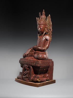 Lot 17 - A LARGE LACQUERED WOOD FIGURE OF JAMBUPATI BUDDHA, SHAN STATES