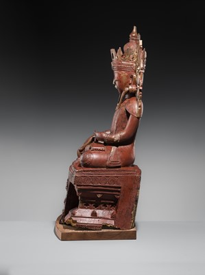 Lot 17 - A LARGE LACQUERED WOOD FIGURE OF JAMBUPATI BUDDHA, SHAN STATES
