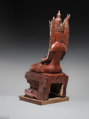 Lot 17 - A LARGE LACQUERED WOOD FIGURE OF JAMBUPATI BUDDHA, SHAN STATES
