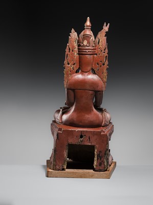 Lot 17 - A LARGE LACQUERED WOOD FIGURE OF JAMBUPATI BUDDHA, SHAN STATES