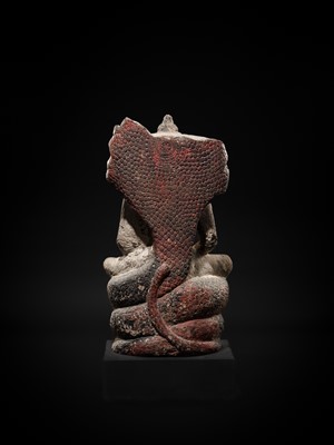 Lot 24 - A RARE SANDSTONE FIGURE OF BUDDHA MUCHALINDA, LOPBURI STYLE, 13TH CENTURY
