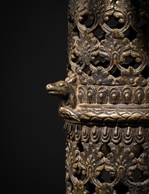 Lot 113 - A LARGE BRONZE TEMPLE LAMP DEPICTING SURYA ATOP HIS CHARIOT, NEPAL, 18TH CENTURY