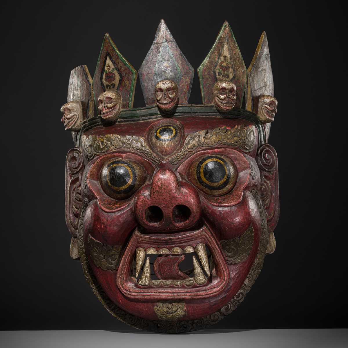 Lot 32 - A MONUMENTAL AND IMPRESSIVE POLYCHROME WOOD MASK OF MAHAKALA, TIBET, 19TH CENTURY