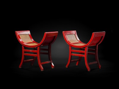 Lot 155 - A PAIR OF RED-LACQUERED WOOD AND RATTAN KARTINI STOOLS