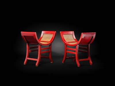 Lot 155 - A PAIR OF RED-LACQUERED WOOD AND RATTAN KARTINI STOOLS