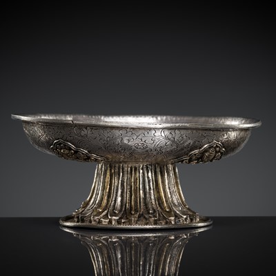 Lot 212 - A PARCEL-GILT SILVER REPOUSSÉ ‘BAJIXIANG’ STEM BOWL, 18TH CENTURY