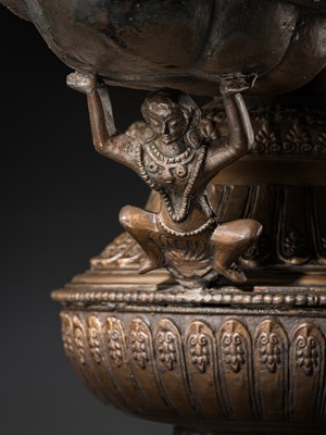 Lot 114 - A MASSIVE NEWAR COPPER ALLOY RITUAL LAMP, SUKUNDA, 18TH-19TH CENTURY