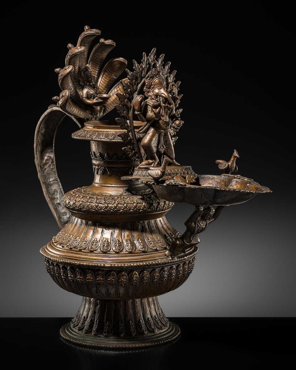 Lot 114 - A MASSIVE NEWAR COPPER ALLOY RITUAL LAMP, SUKUNDA, 18TH-19TH CENTURY
