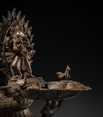 Lot 114 - A MASSIVE NEWAR COPPER ALLOY RITUAL LAMP, SUKUNDA, 18TH-19TH CENTURY