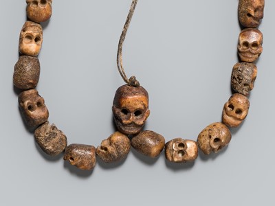 Lot 6 - A CARVED BONE MALA WITH SKULL BEADS, SIN-‘PHEN, 18TH-19TH CENTURY