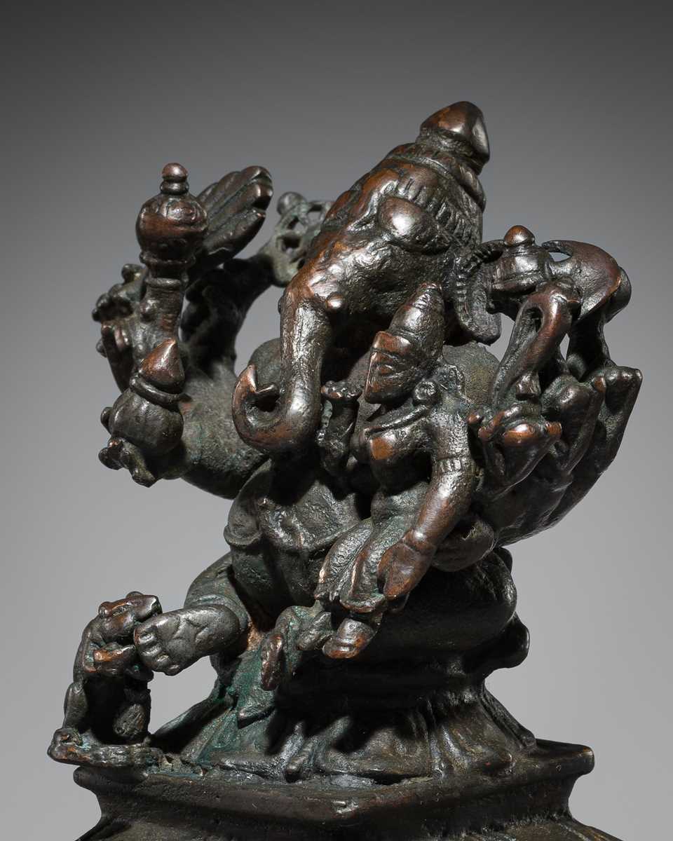 Lot 74 - A BRONZE GROUP OF GANESHA AND SHAKTI, VIJAYANAGAR EMPIRE, 16TH CENTURY