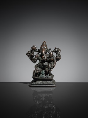 Lot 74 - A BRONZE GROUP OF GANESHA AND SHAKTI, VIJAYANAGAR EMPIRE, 16TH CENTURY