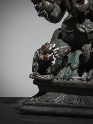 Lot 74 - A BRONZE GROUP OF GANESHA AND SHAKTI, VIJAYANAGAR EMPIRE, 16TH CENTURY