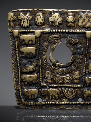 Lot 192 - A COPPER-ALLOY 'TWELVE ZODIAC ANIMALS AND EIGHT BUDDHIST EMBLEMS' THOGCHAG, TIBET, 12TH-15TH CENTURY