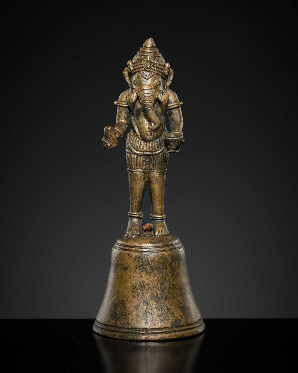 Lot 144 - A BRONZE ‘GANESHA’ ALTAR BELL, ANGKOR PERIOD, 12TH-13TH CENTURY