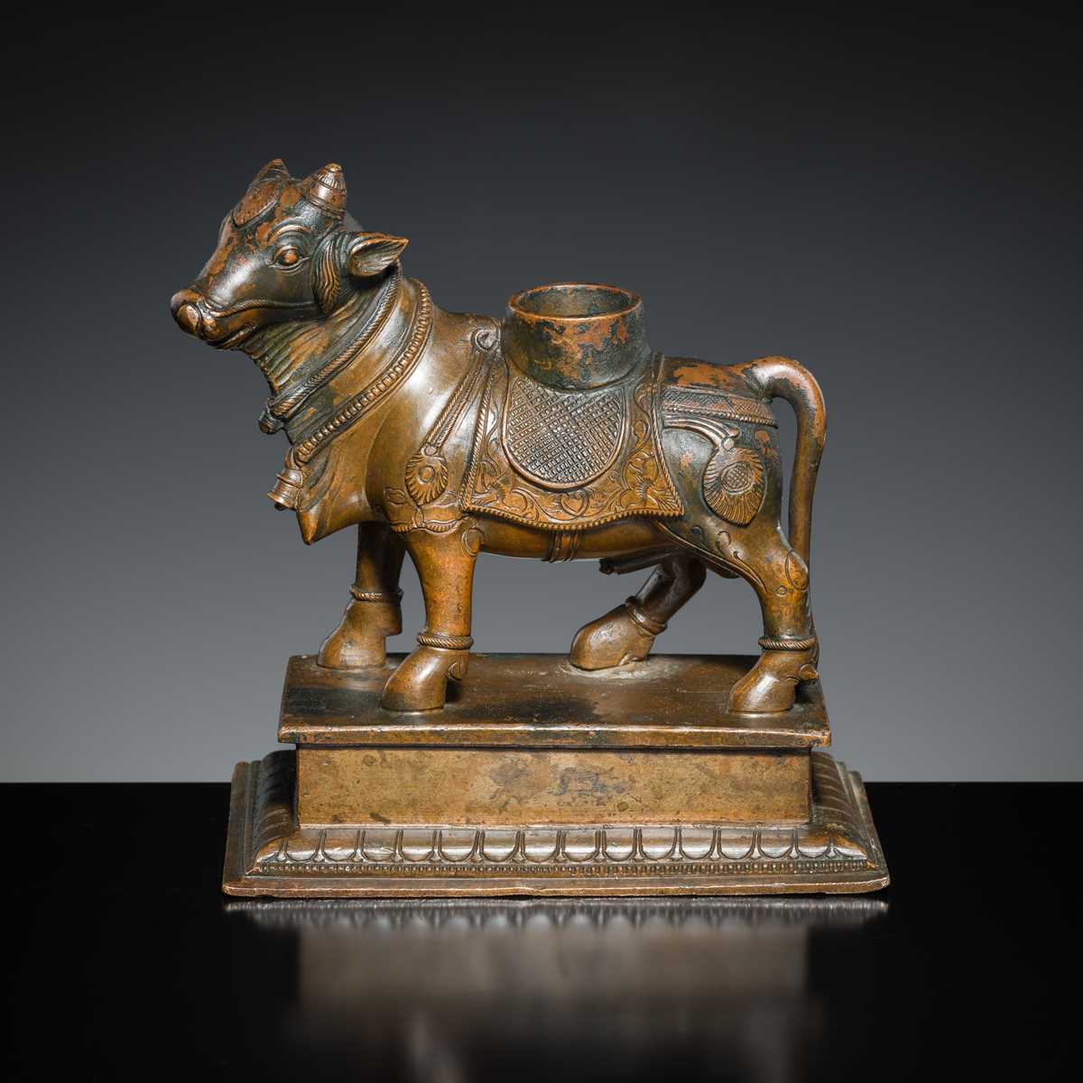 Lot 181 - A BRONZE FIGURE OF NANDI, SOUTH INDIA, 19TH CENTURY