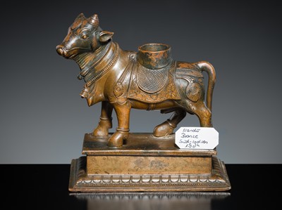 Lot 181 - A BRONZE FIGURE OF NANDI, SOUTH INDIA, 19TH CENTURY