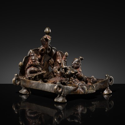 Lot 83 - A MINIATURE BRONZE SHRINE WITH SHIVA-LINGAM AND NAGA, MAHARASHTRA, 18TH-19TH CENTURY
