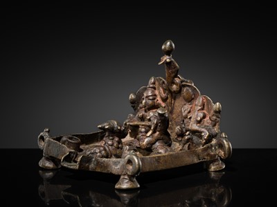 Lot 83 - A MINIATURE BRONZE SHRINE WITH SHIVA-LINGAM AND NAGA, MAHARASHTRA, 18TH-19TH CENTURY