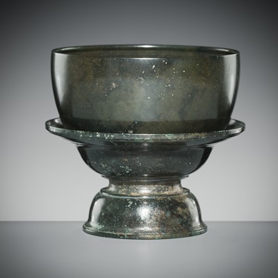 Lot 143 - A KHMER BRONZE BOWL AND STAND, ANGKOR PERIOD, 13TH CENTURY