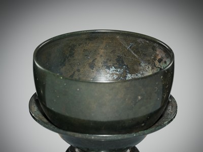 Lot 143 - A KHMER BRONZE BOWL AND STAND, ANGKOR PERIOD, 13TH CENTURY
