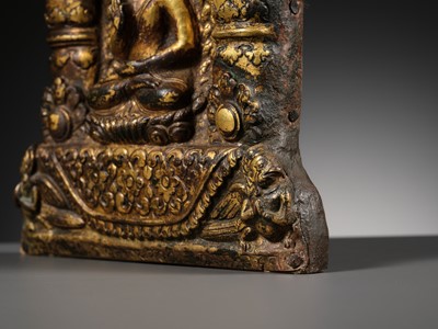 Lot 117 - AN IMPORTANT GROUP OF FOUR INSCRIBED GILT-COPPER REPOUSSÉ RELIEFS DEPICTING WISDOM BUDDHAS, 17TH-18TH CENTURY