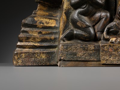 Lot 117 - AN IMPORTANT GROUP OF FOUR INSCRIBED GILT-COPPER REPOUSSÉ RELIEFS DEPICTING WISDOM BUDDHAS, 17TH-18TH CENTURY