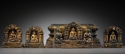 Lot 117 - AN IMPORTANT GROUP OF FOUR INSCRIBED GILT-COPPER REPOUSSÉ RELIEFS DEPICTING WISDOM BUDDHAS, 17TH-18TH CENTURY