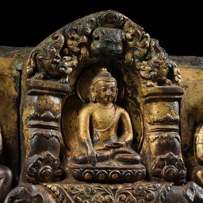 Lot 117 - AN IMPORTANT GROUP OF FOUR INSCRIBED GILT-COPPER REPOUSSÉ RELIEFS DEPICTING WISDOM BUDDHAS, 17TH-18TH CENTURY