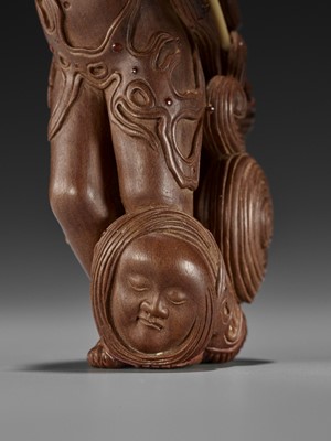 Lot 195 - TANETOSHI: A LARGE AND UNUSUAL INLAID WOOD NETSUKE OF HANNYA WITH FAMILY