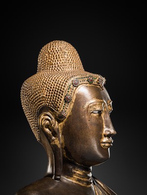 Lot 21 - A RARE AND LARGE GILT-LACQUERED BRONZE BUST OF BUDDHA, EARLY MANDALAY PERIOD