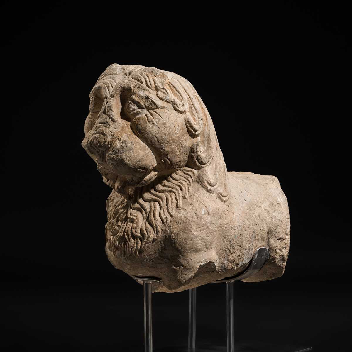Lot 59 - A GRAY SCHIST CARVING OF A BUDDHIST LION, KUSHAN PERIOD