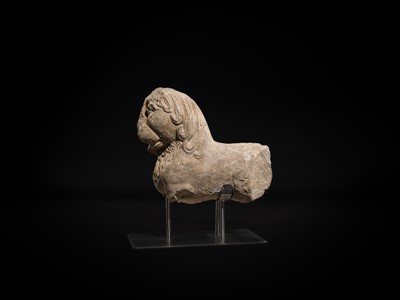 Lot 59 - A GRAY SCHIST CARVING OF A BUDDHIST LION, KUSHAN PERIOD